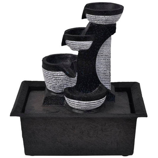 Zimmerbrunnen mit LED-Leuchten aus Polyresin