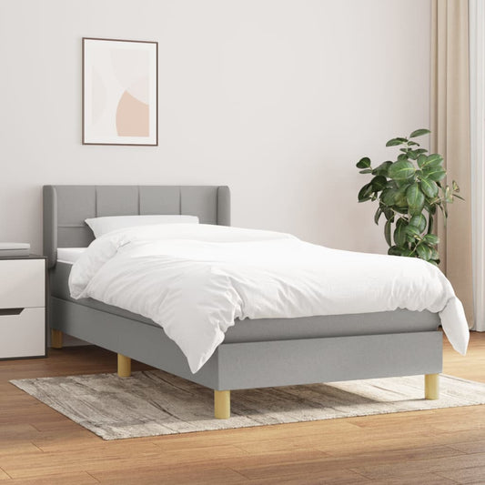 Spring bed frame with light gray mattress 90x200 cm fabric