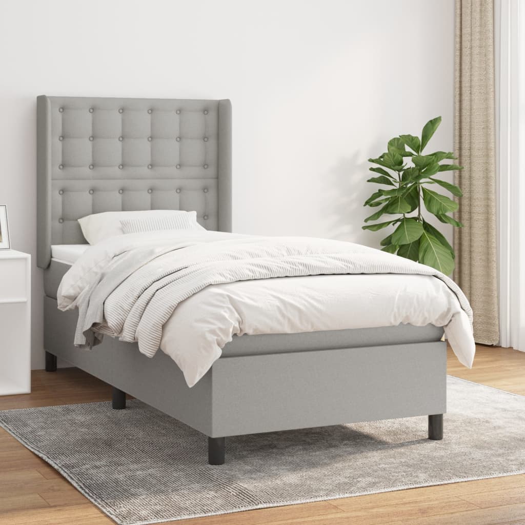 Spring bed frame with light gray mattress 90x200 cm fabric