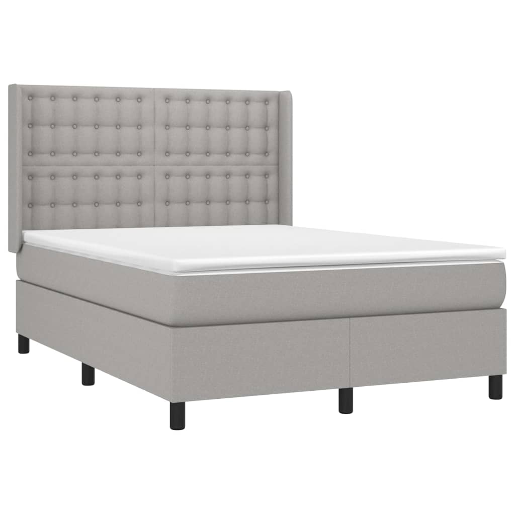 Spring bed frame with light gray mattress 140x190cm fabric