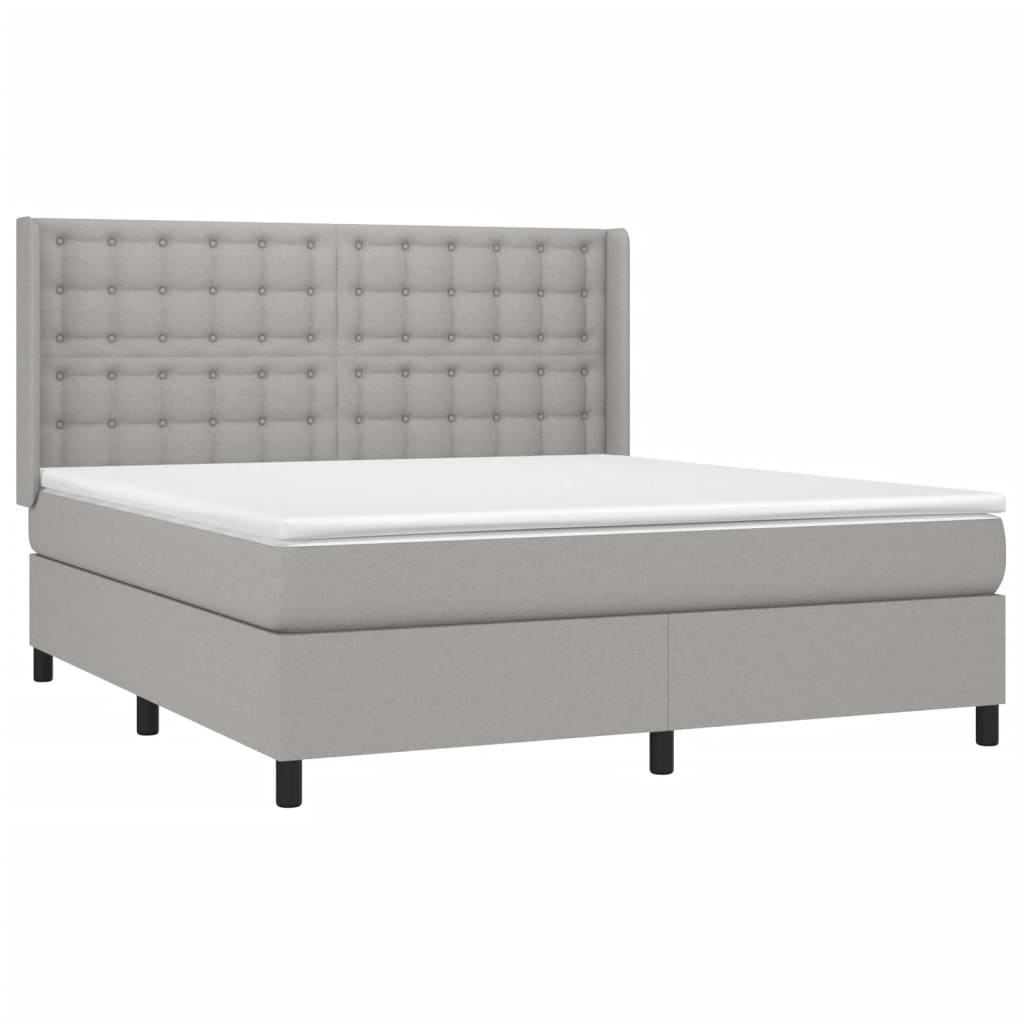 Spring bed frame with light gray mattress 180x200 cm fabric