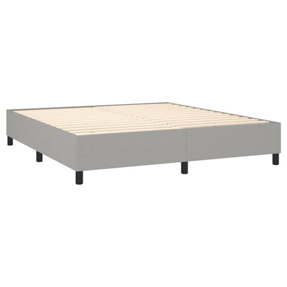 Spring bed frame with light gray mattress 180x200 cm fabric