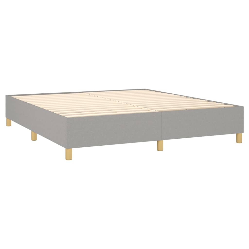 Spring bed frame with light gray mattress 180x200 cm fabric