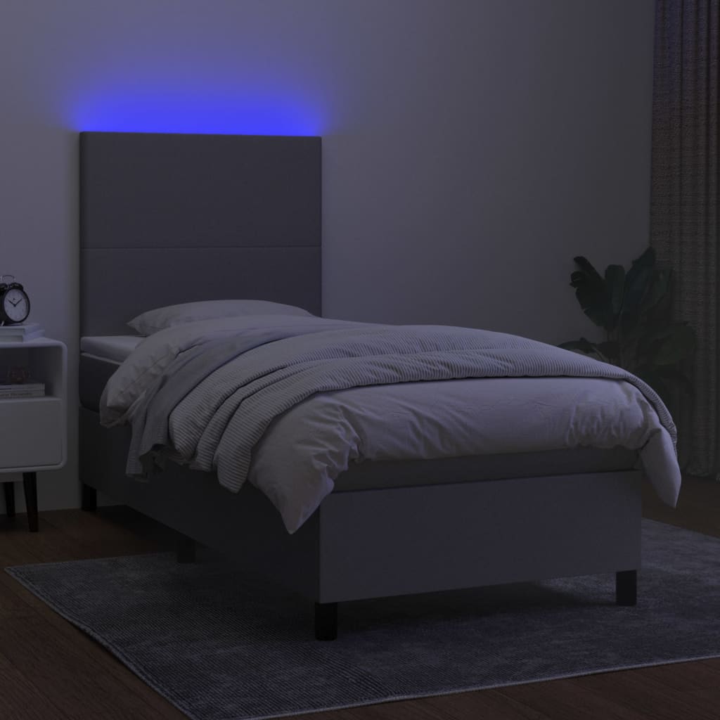 Letto a Molle Materasso e LED Grigio Chiaro 90x190 cm Tessuto