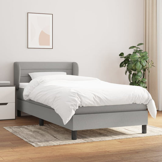 Spring bed frame with light gray mattress 90x200 cm fabric