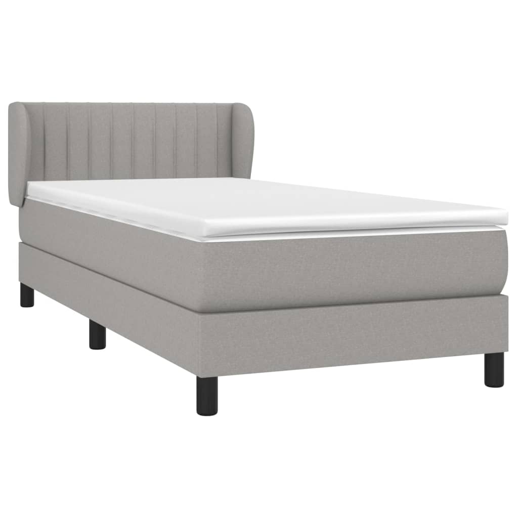 Spring bed frame with light gray mattress 90x200 cm fabric