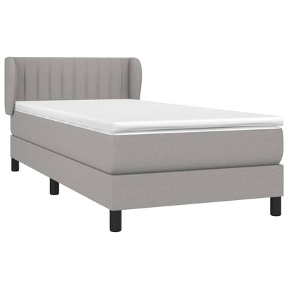 Spring bed frame with light gray mattress 90x200 cm fabric