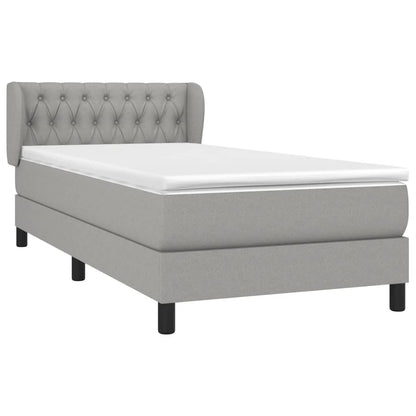 Spring bed frame with light gray mattress 100x200 cm fabric