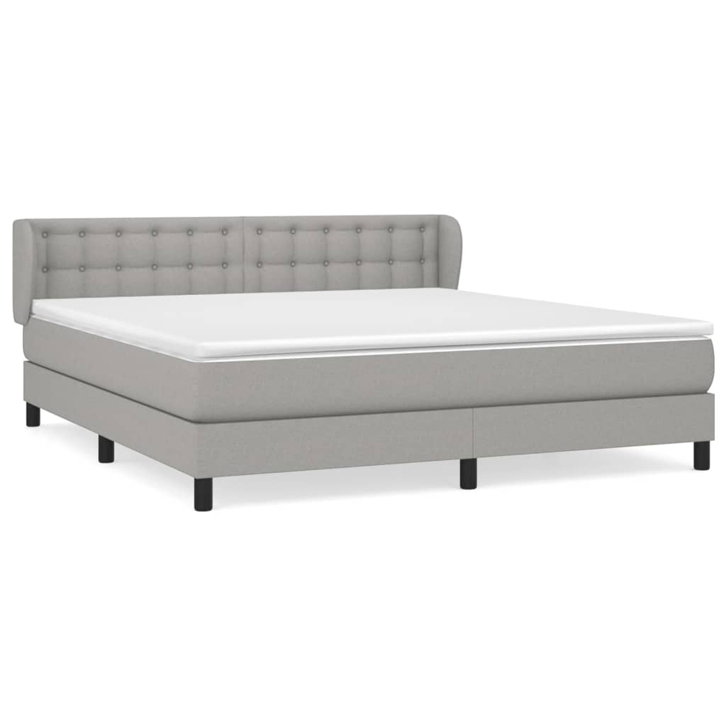 Spring bed frame with light gray mattress 180x200 cm fabric