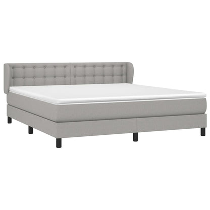 Spring bed frame with light gray mattress 180x200 cm fabric