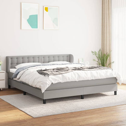 Spring bed frame with light gray mattress 180x200 cm fabric