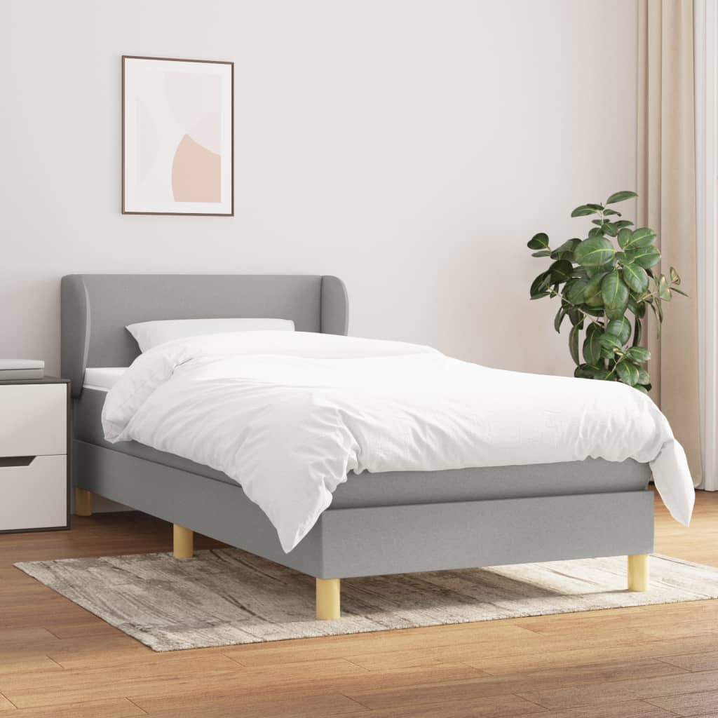 Spring bed frame with light gray mattress 90x200 cm fabric