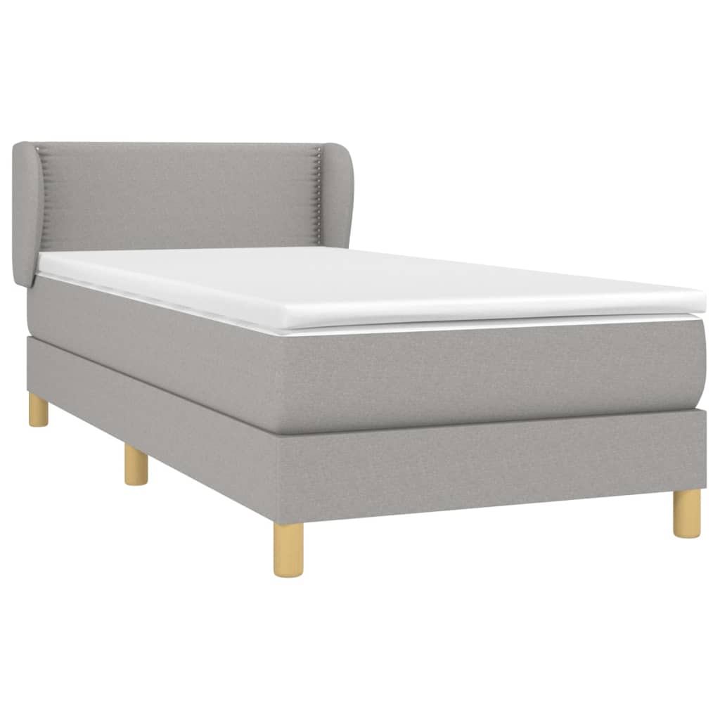 Spring bed frame with light gray mattress 90x200 cm fabric