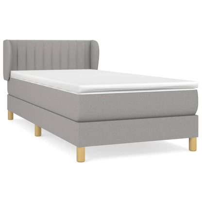 Spring bed frame with light gray mattress 90x190 cm fabric