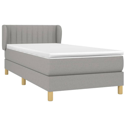 Spring bed frame with light gray mattress 90x190 cm fabric