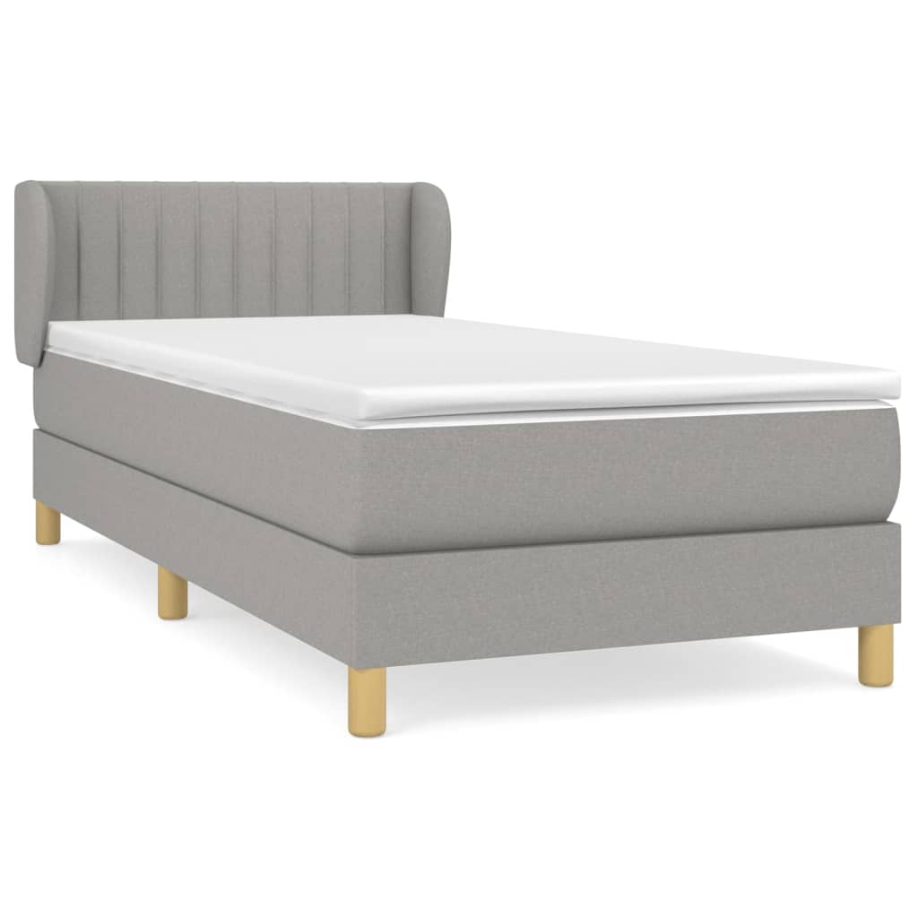 Spring bed frame with light gray mattress 90x200 cm fabric