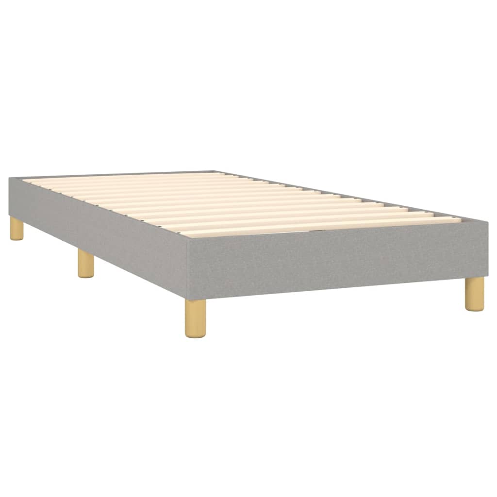 Spring bed frame with light gray mattress 90x200 cm fabric