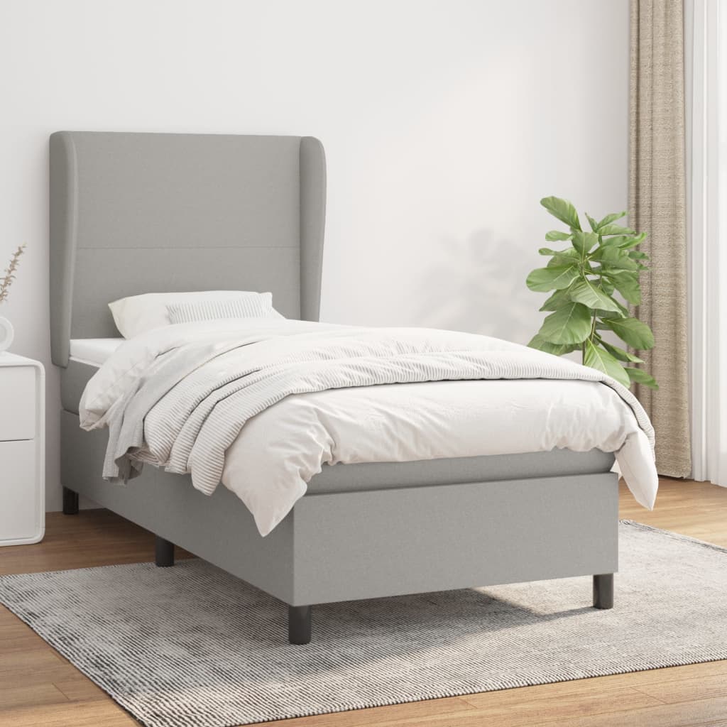 Spring bed frame with light gray mattress 90x200 cm fabric