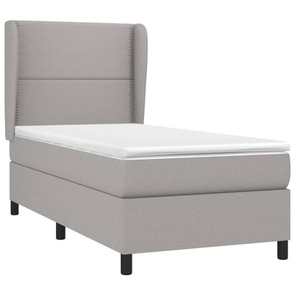 Spring bed frame with light gray mattress 90x200 cm fabric