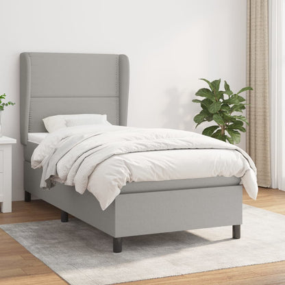 Spring bed frame with light gray mattress 90x200 cm fabric