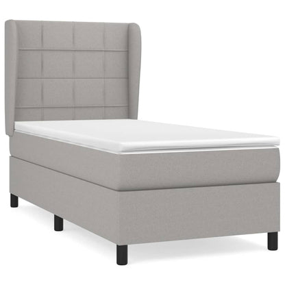 Spring bed frame with light gray mattress 90x200 cm fabric