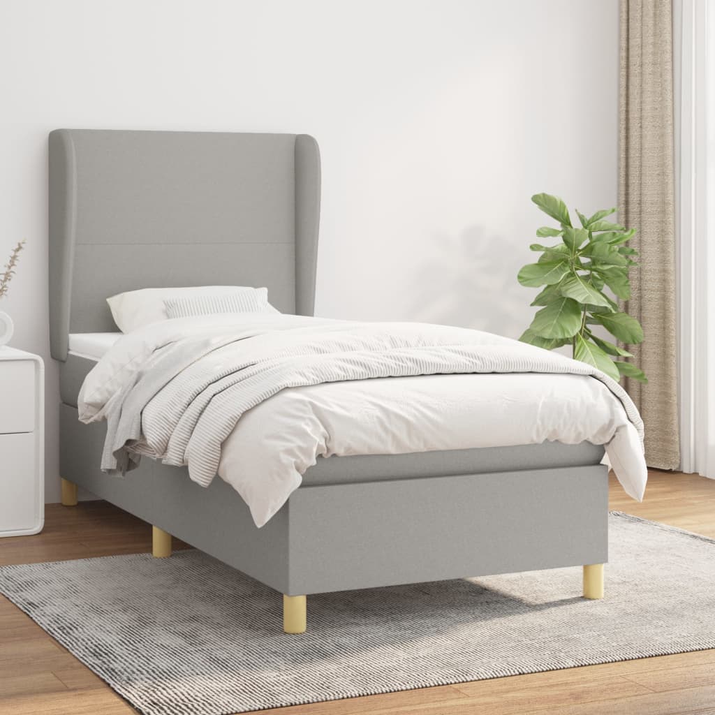 Spring bed frame with light gray mattress 90x200 cm fabric