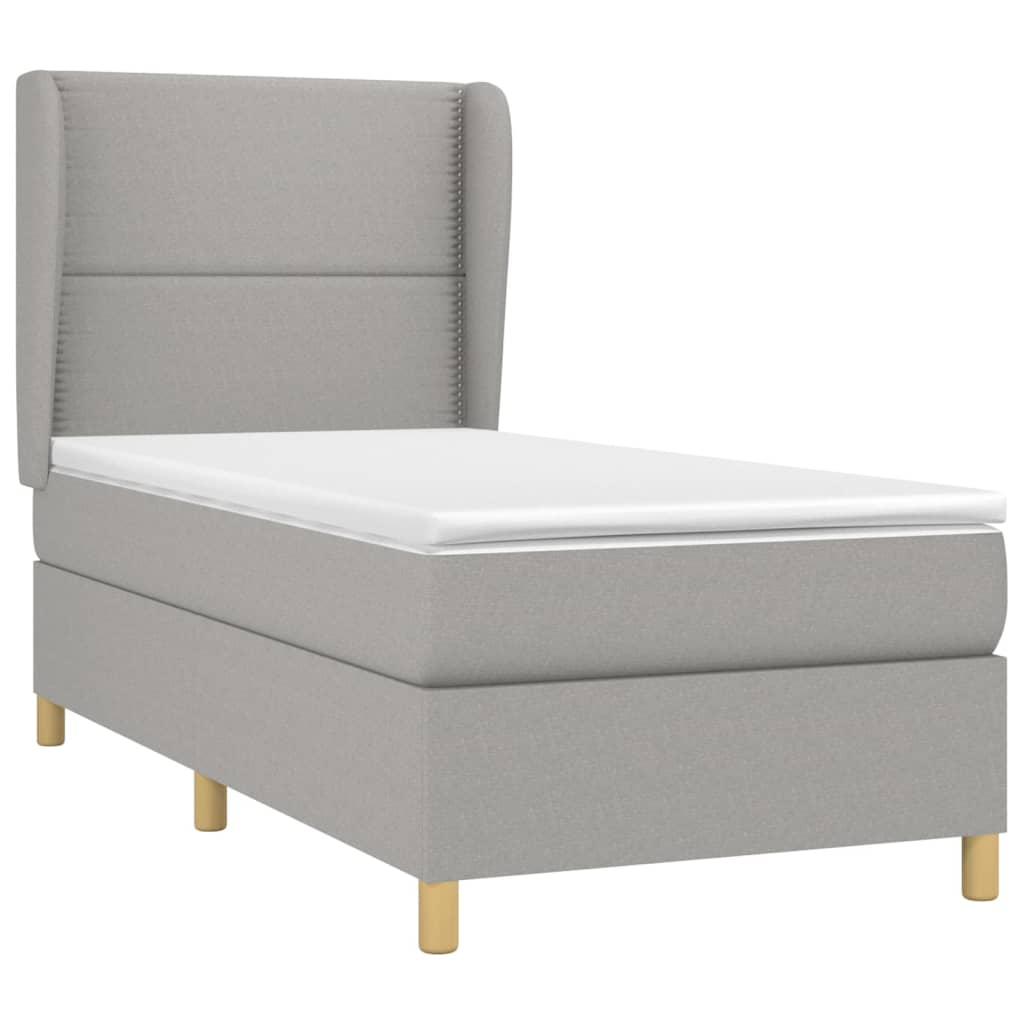 Spring bed frame with light gray mattress 90x200 cm fabric