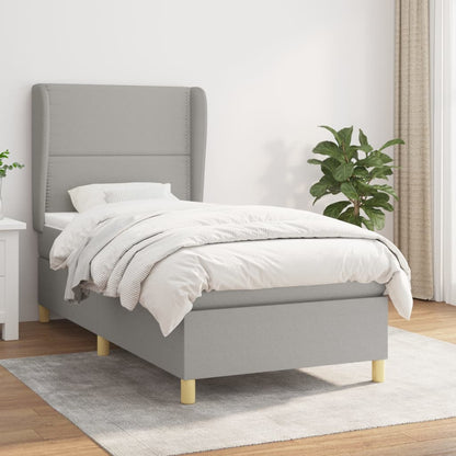 Spring bed frame with light gray mattress 90x200 cm fabric