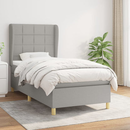 Spring bed frame with light gray mattress 90x200 cm fabric