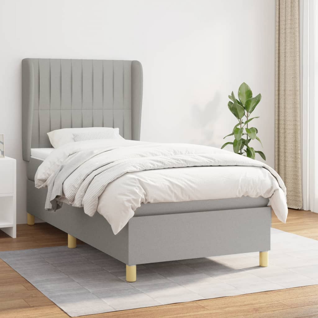 Spring bed frame with light gray mattress 90x200 cm fabric