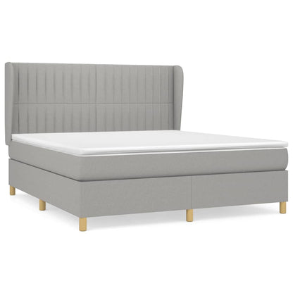 Spring bed frame with light gray mattress 160x200 cm fabric