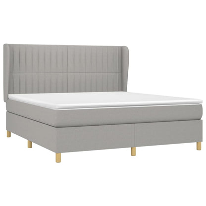 Spring bed frame with light gray mattress 160x200 cm fabric