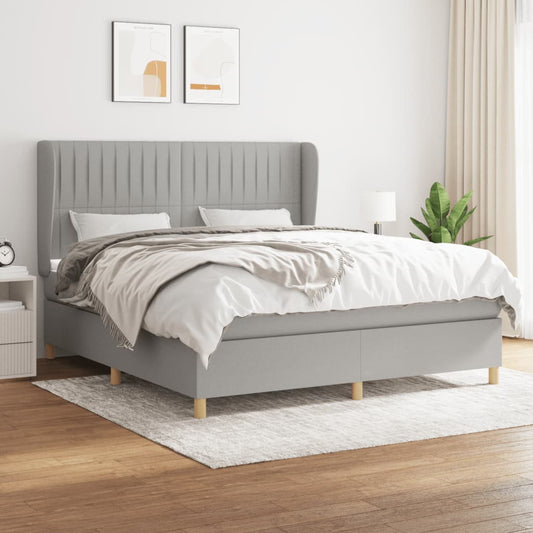 Spring bed frame with light gray mattress 160x200 cm fabric