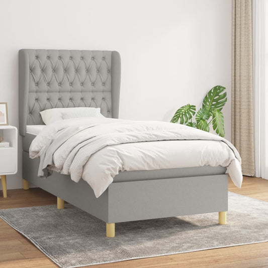 Spring bed frame with light gray mattress 90x200 cm fabric