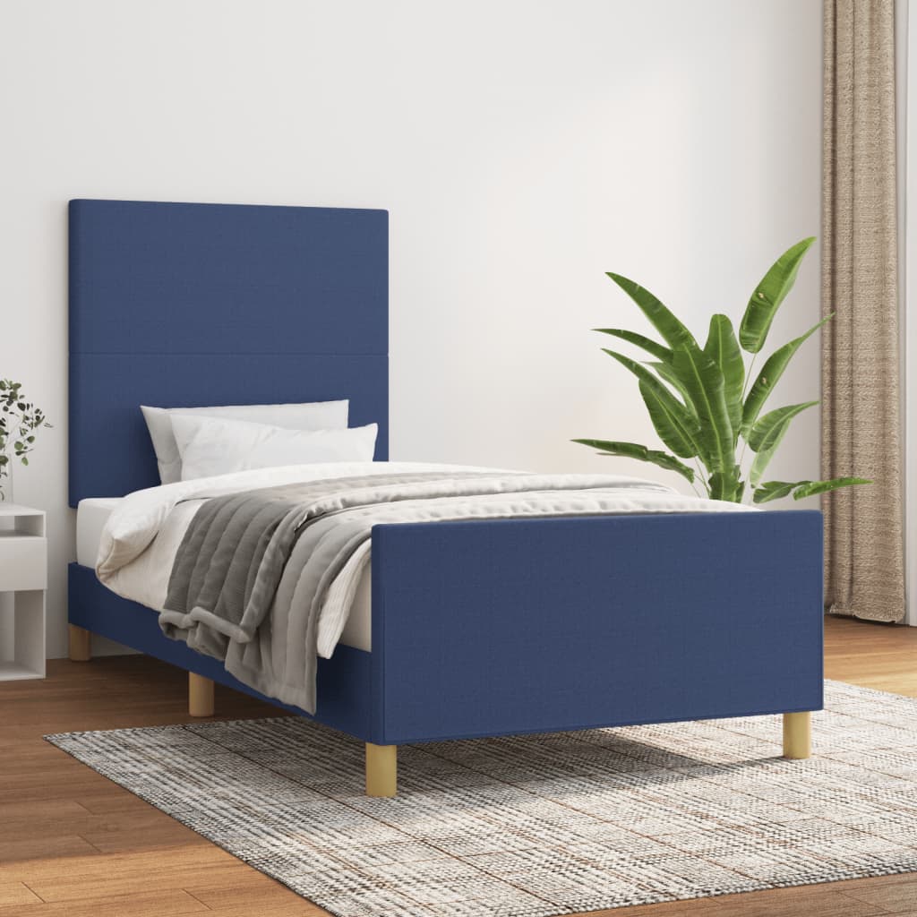 Bed frame with blue headboard 90x190 cm in fabric