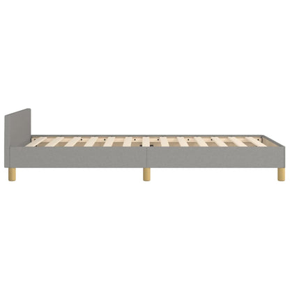 Bed frame with light gray headboard 90x190 cm in fabric