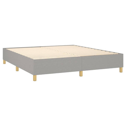 Spring bed frame with light gray mattress 160x200 cm fabric