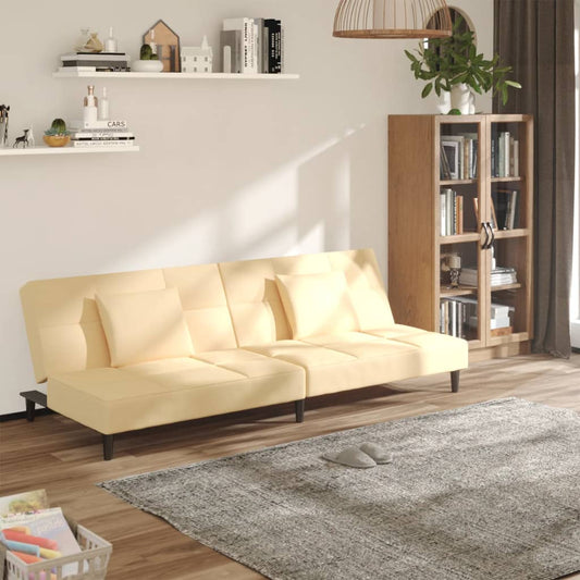 2-Sitzer-Schlafsofa mit 2 cremefarbenen Samtkissen