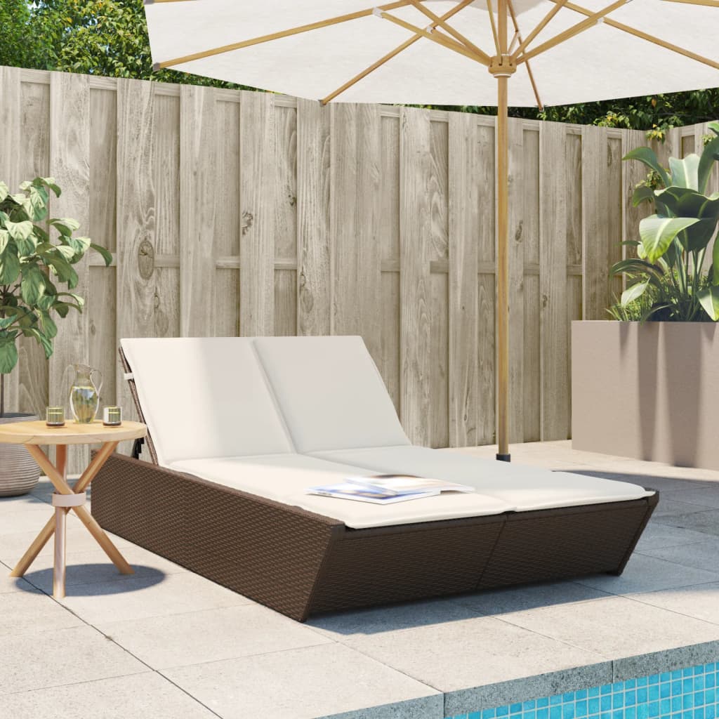 Sun lounger with brown cushions in polyrattan
